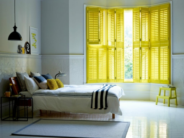 Bi Folding Yellow Plantation Shutters