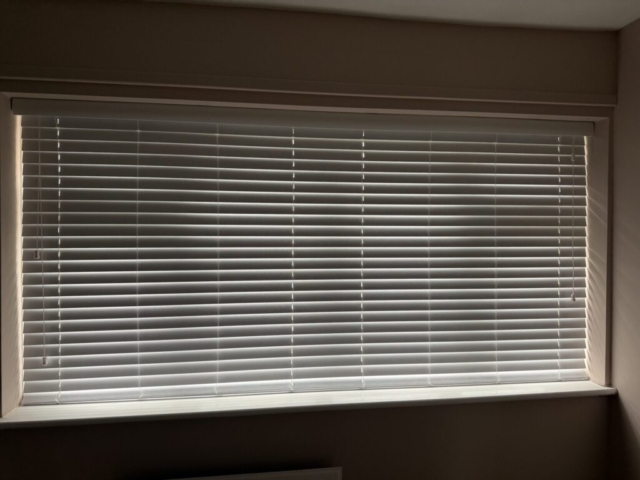 Closed Venetian Blind in Front Bedroom Newton Heath Venetian blind fitted in a front bedroom in Newton Heath by Scarlet Blinds and Shutters, blinds shown closed for privacy