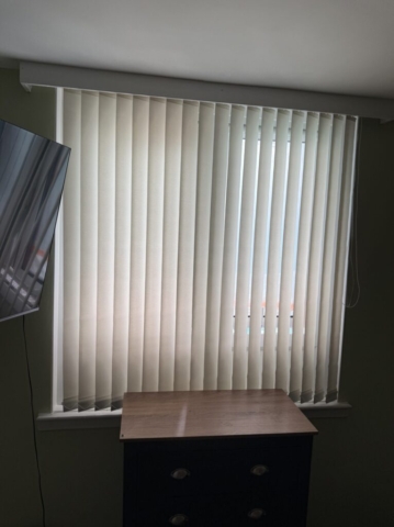 Vertical Blind Slats Replacement in Dobson Court Newton Heath Vertical blind slats replacement in Dobson Court, Newton Heath, fitted by Scarlet Blinds and Shutters for living room patio doors, adjacent window, and side window and bedroom area