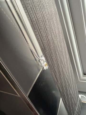 Child Safe Vertical Blind Fitting in Blackley, Manchester Child safety device fitted to vertical blinds in Blackley, Manchester