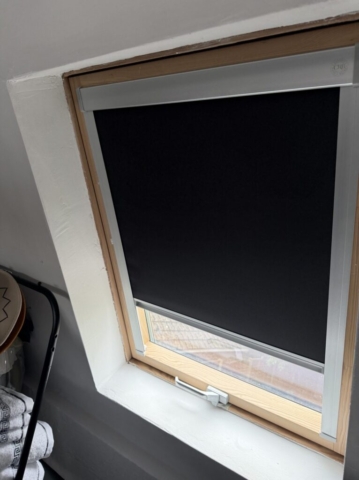 black-optilight-skylight-blind-half-open-fitted-by-scarlet-blinds-and-shutters-little-lever-bolton Black OptiLight skylight blind half open fitted by Scarlet Blinds and Shutters in Little Lever, Bolton